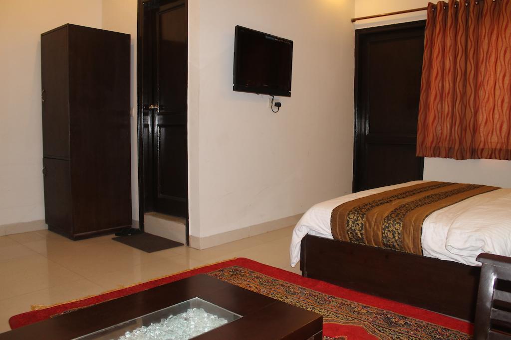 Airport Hotel Jet Inn Suites Neu-Delhi Zimmer foto